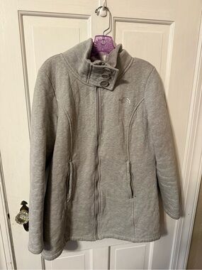 This is a grey The North Face Caroluna quilted fleece-lined jacket.